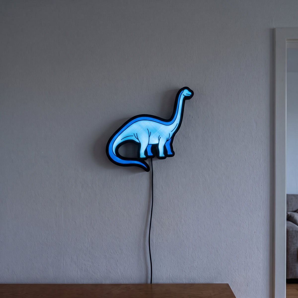 Diplodocus Lampe, an der Wand leuchtend